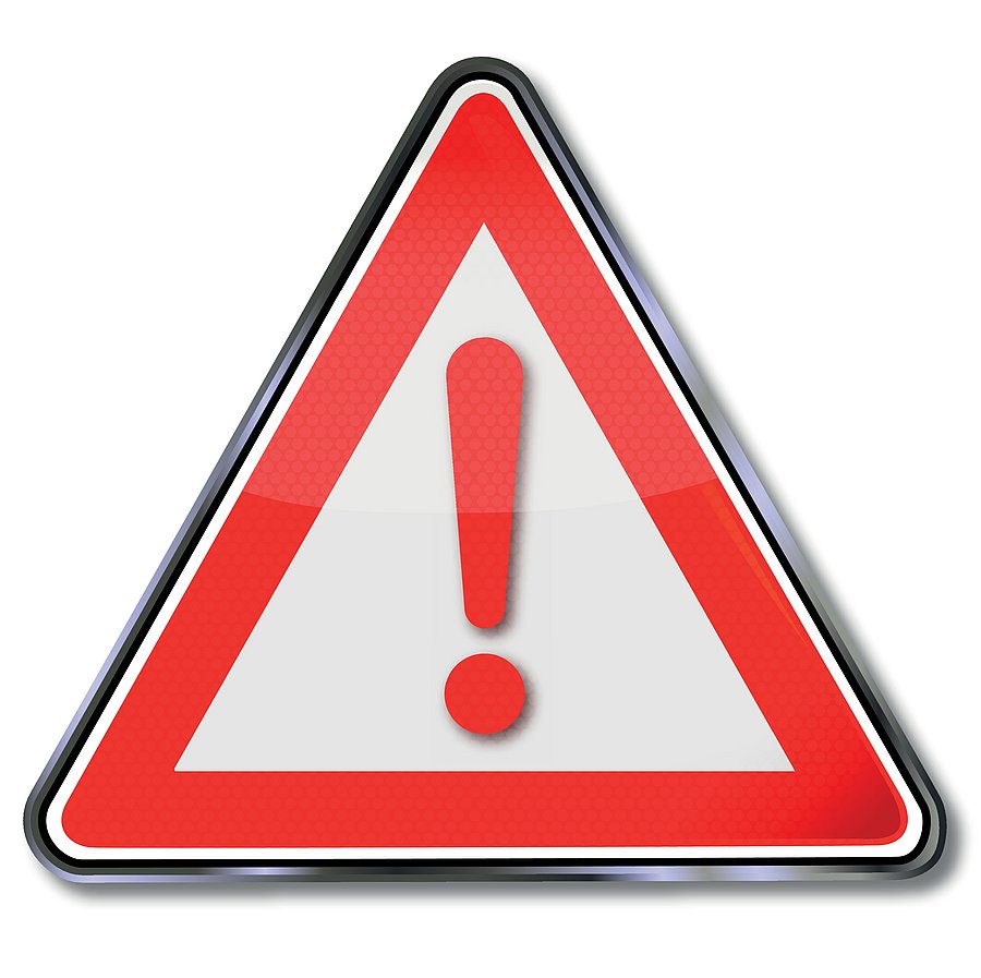 Ein Achtung-Schild mit einem roten Ausrufezeichen in der Mitte
